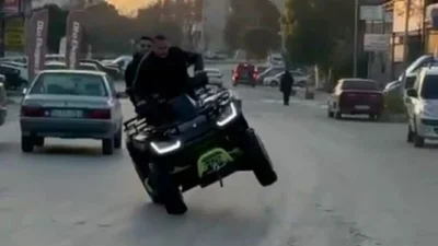 mir'in Bornova ilçesinde arkasında yolcu varken ATV ile drift yapıp